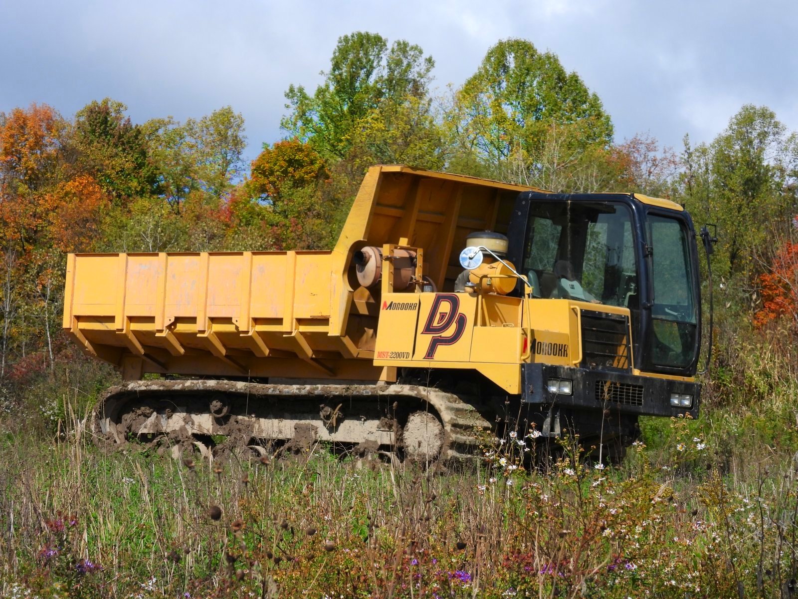Jigsaw Puzzle 63 pieces Dump Truck with Tracks Not Wheels Jigidi