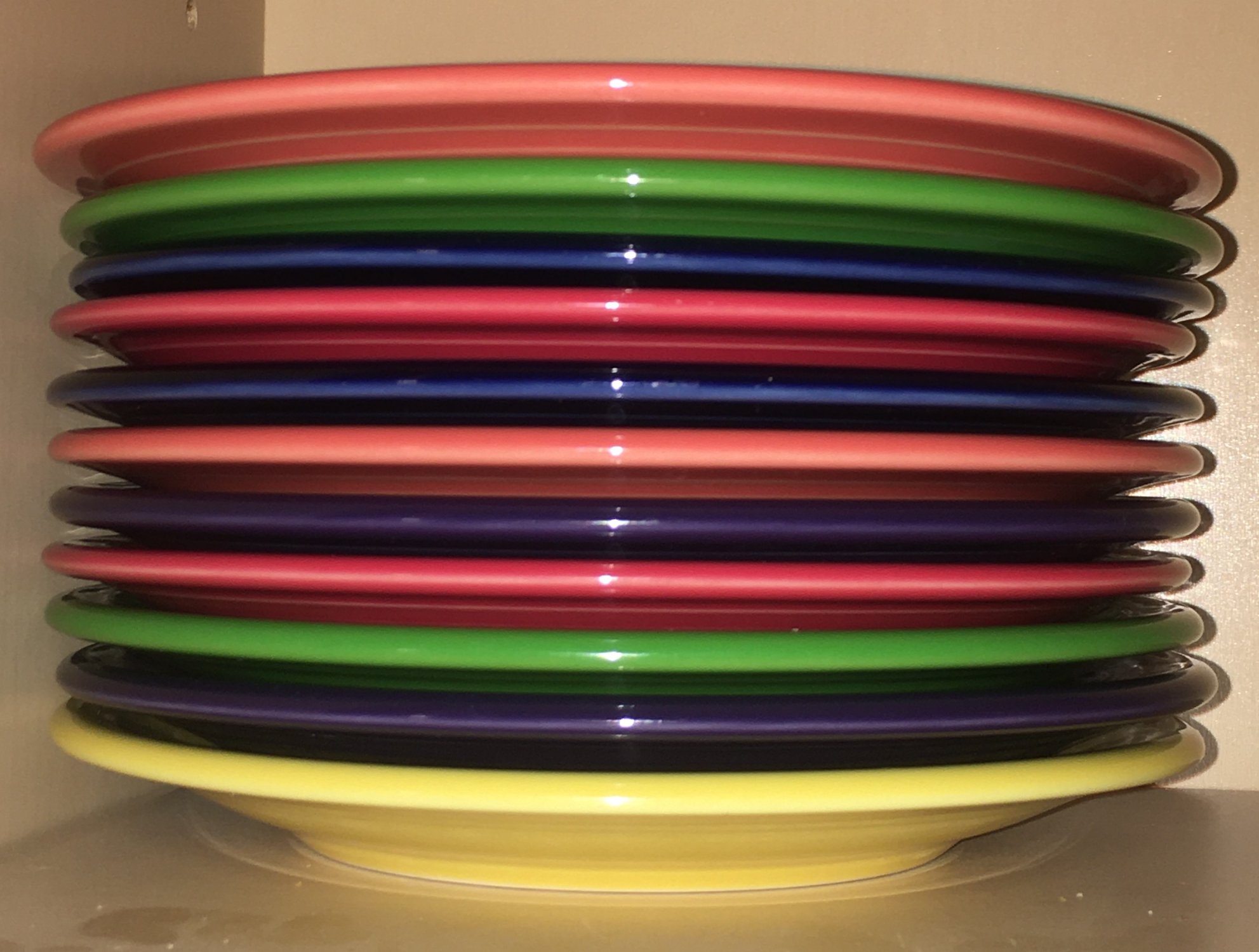 Solve Fiestaware salad plates jigsaw puzzle online with 80 pieces