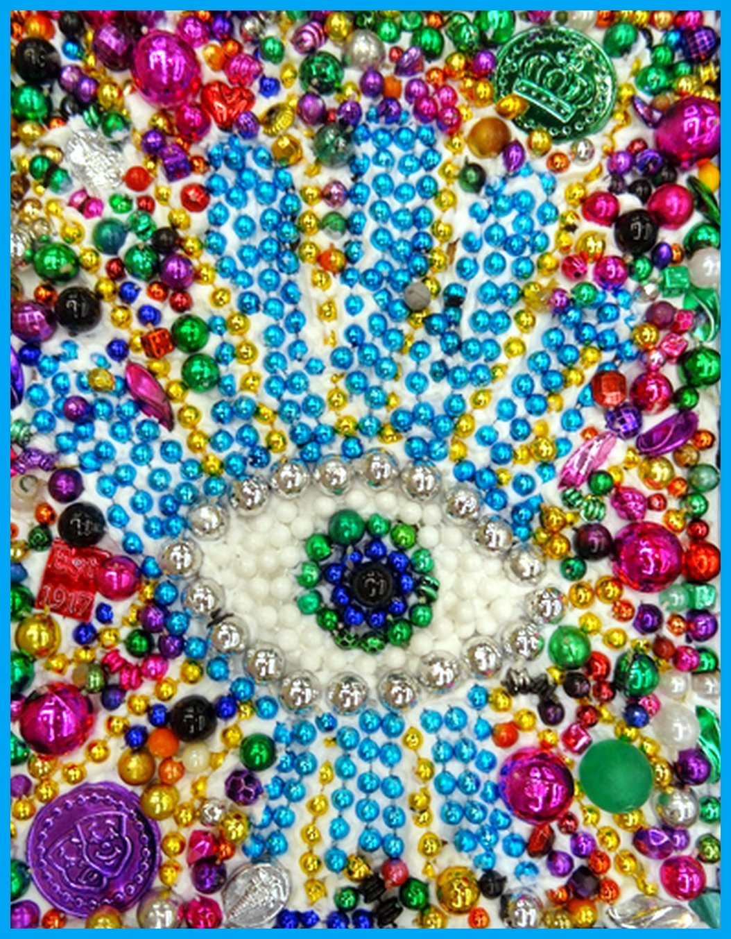 Solve Green-eyed, glass bead art work! jigsaw puzzle online with 48 pieces