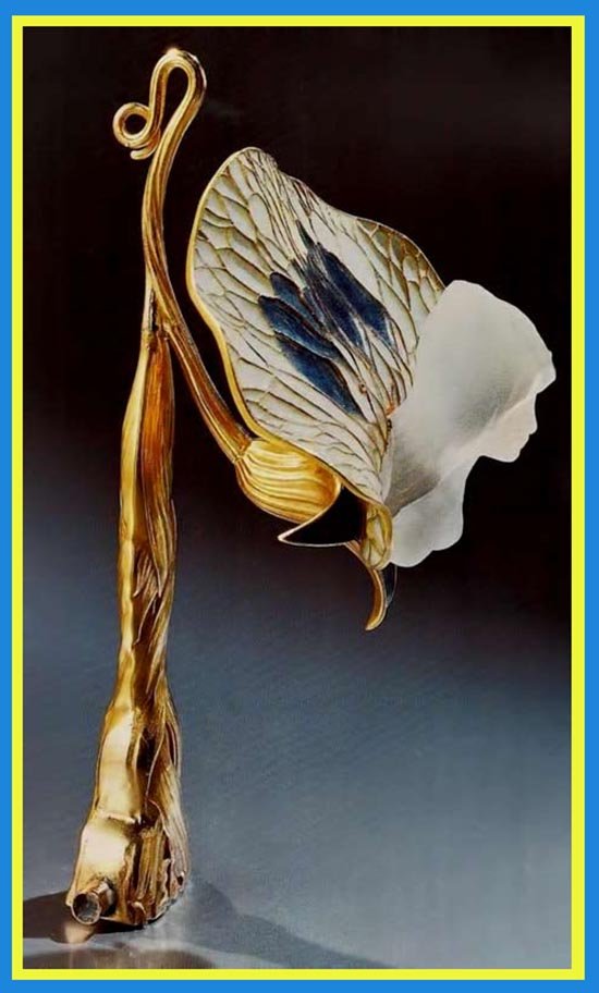 Solve Lalique18991900 Handle goldenamelcast glass. Rene