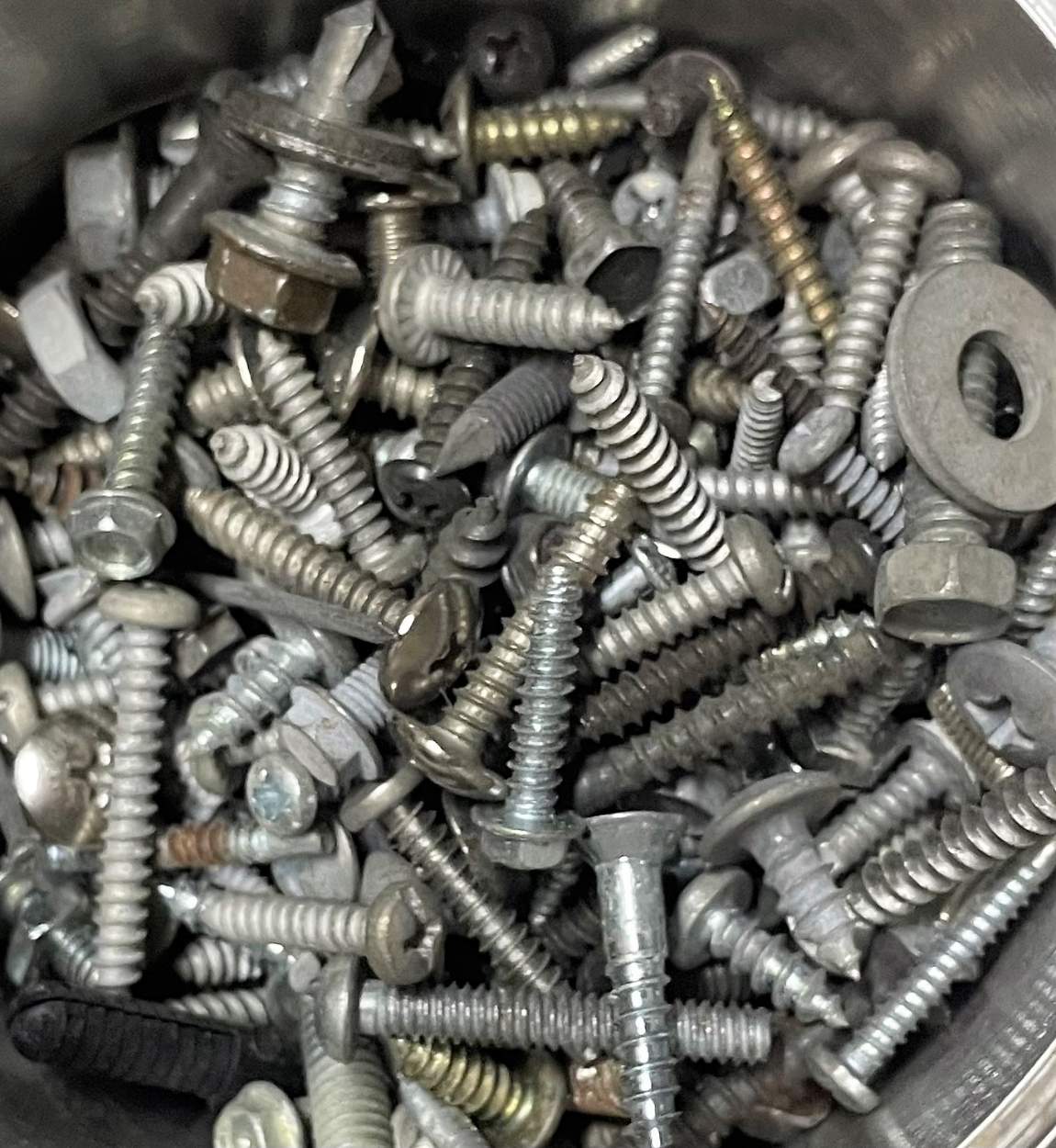 Solve Bucket O'Bolts jigsaw puzzle online with 90 pieces