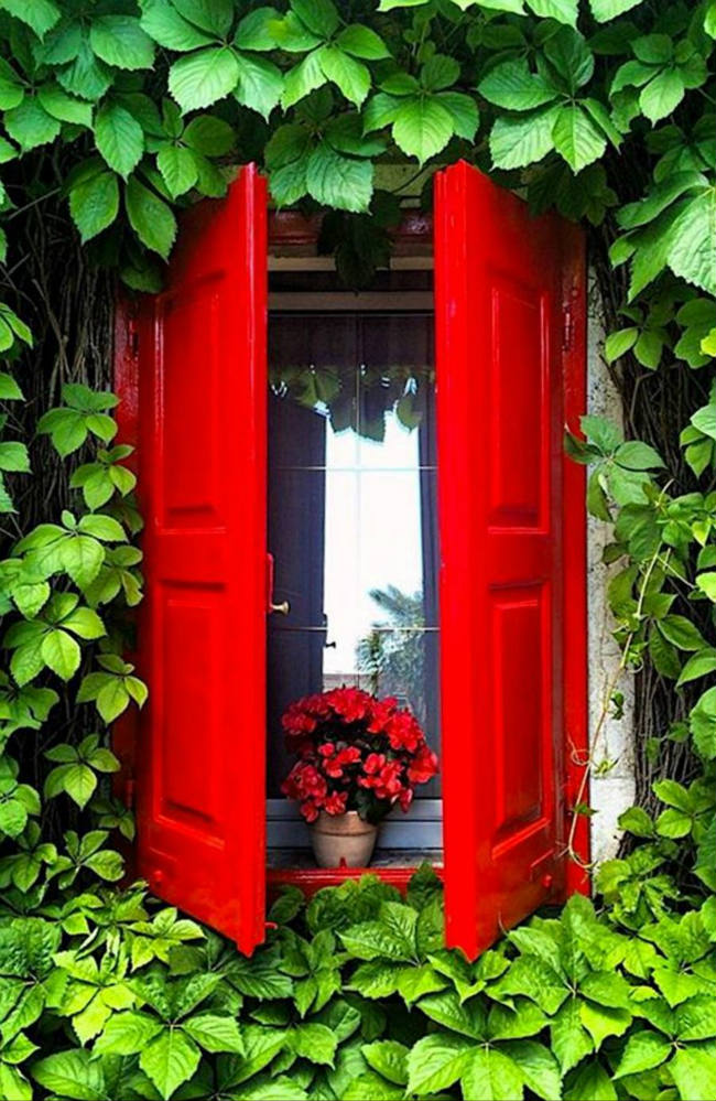 Solve Window With Red Shutters jigsaw puzzle online with 70 pieces