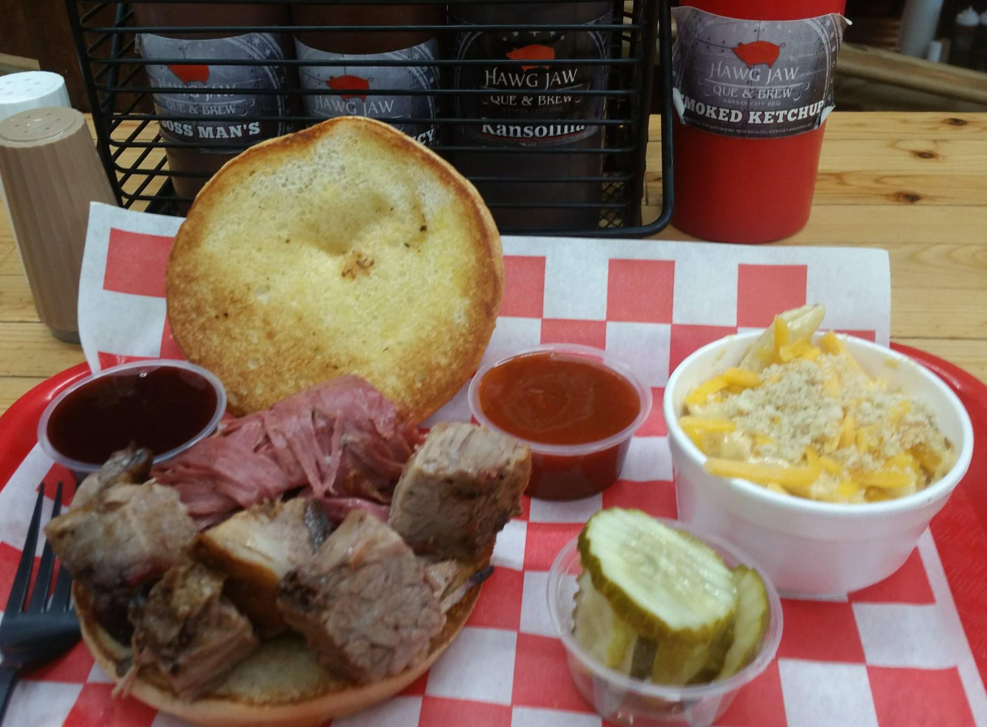 Solve Burnt End Sandwich with pastrami and pickles at Hawg Jaw, North