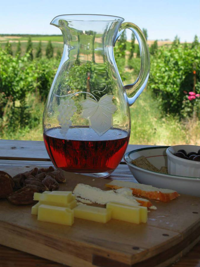 Solve Wine & Cheese jigsaw puzzle online with 63 pieces