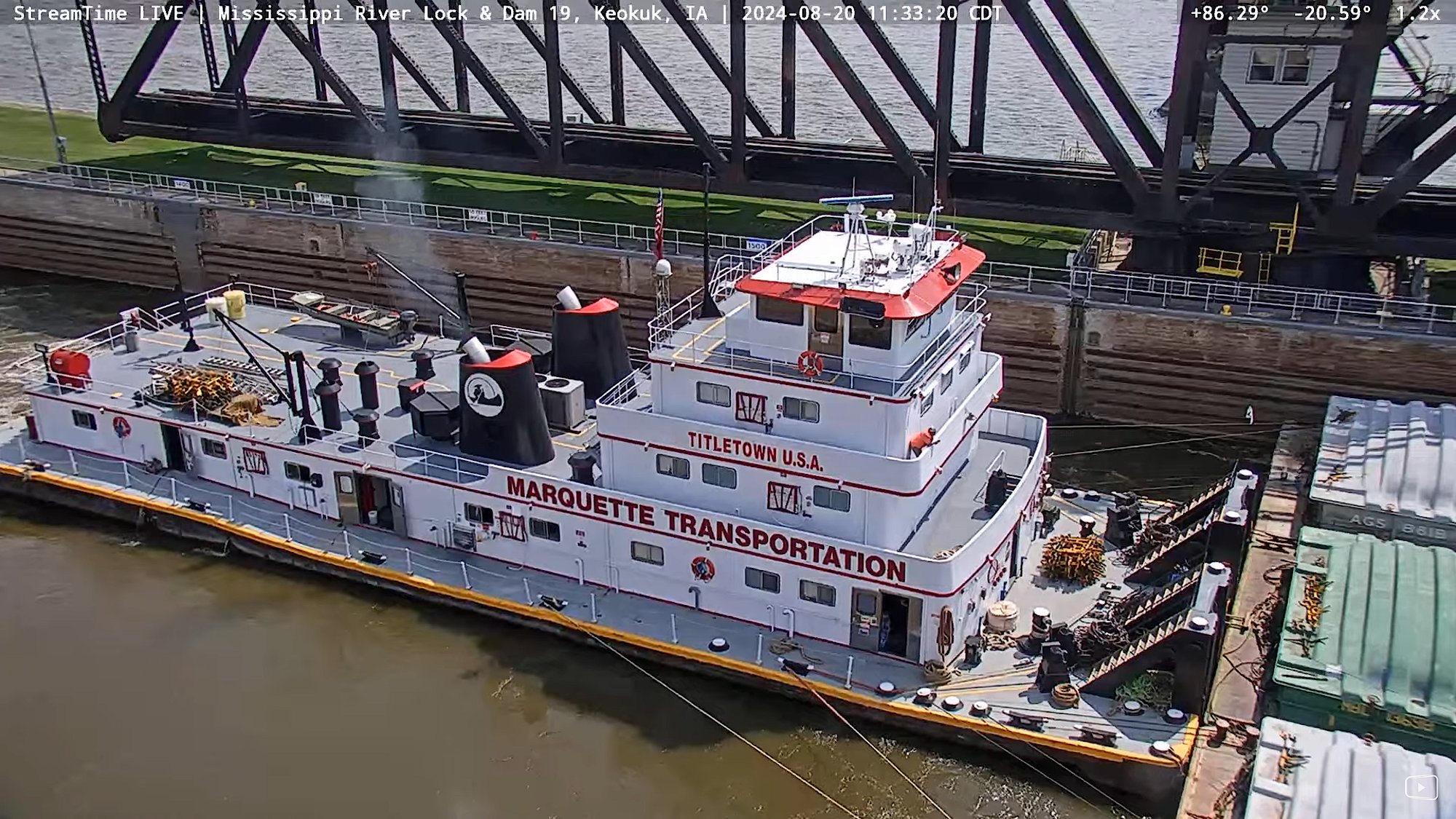 Solve Lock 19, towboat Titletown U.S.A. jigsaw puzzle online with 66 pieces