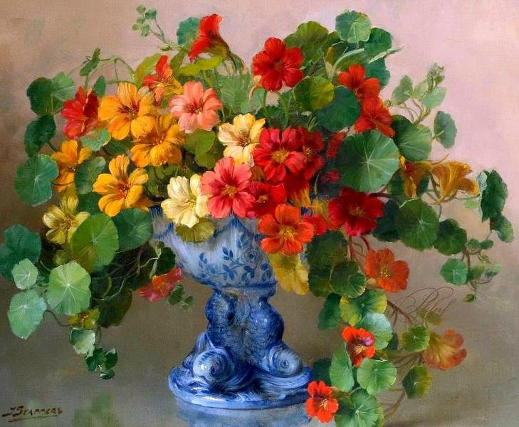 Solve Flowers and greens in ornate blue vase jigsaw puzzle online with 63 pieces