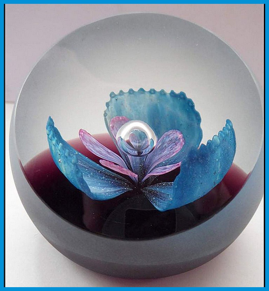 Solve Caithness Glass Paperweights jigsaw puzzle online with 56 pieces