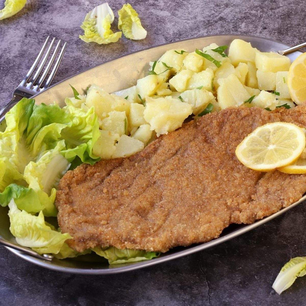 Solve German Veal Wiener Schnitzel jigsaw puzzle online with 400 pieces