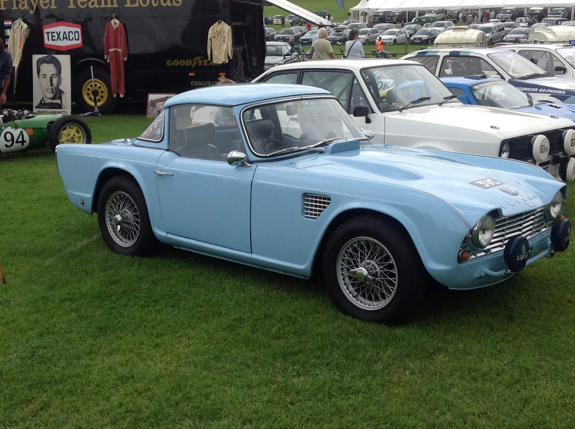 Solve Triumph "TR4" Rally 1962 jigsaw puzzle online with 234 pieces