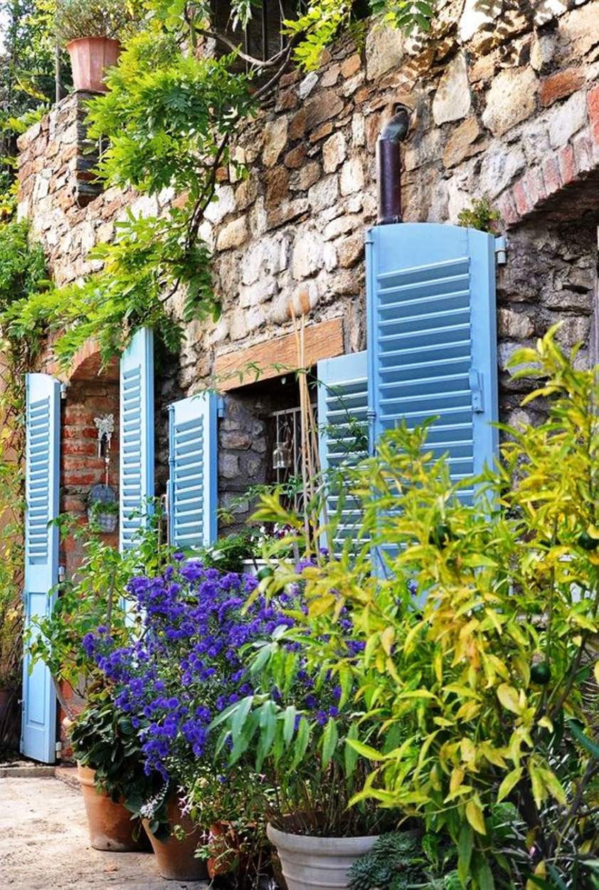 Solve Blue Window Shutters jigsaw puzzle online with 70 pieces