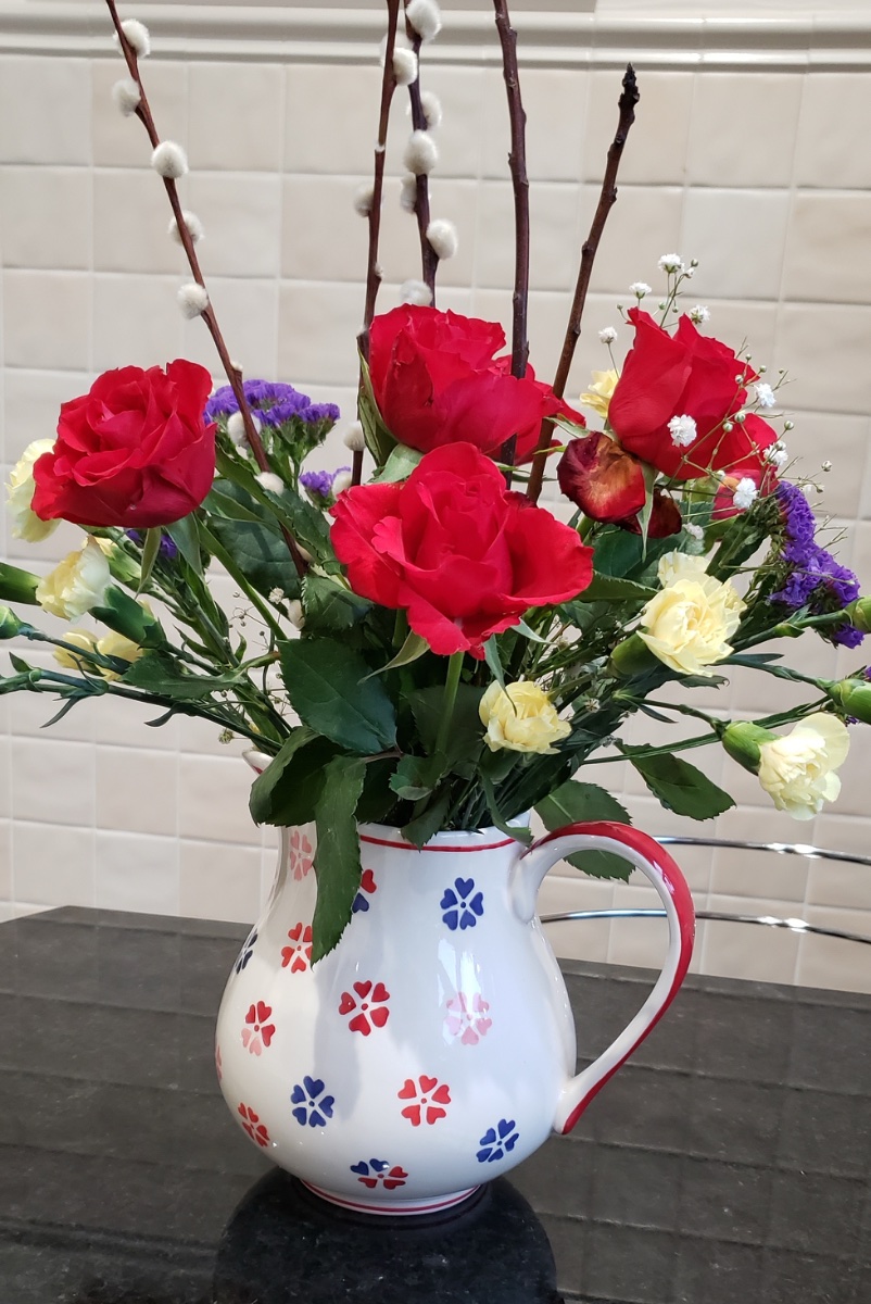 Solve Flowers in a Jug jigsaw puzzle online with 24 pieces