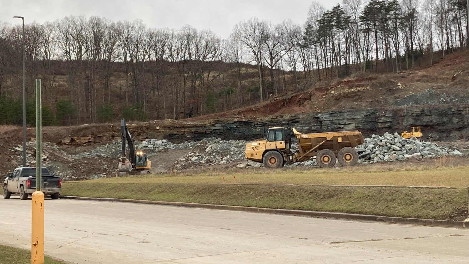 Solve Construction Beside Kohls jigsaw puzzle online with 15 pieces