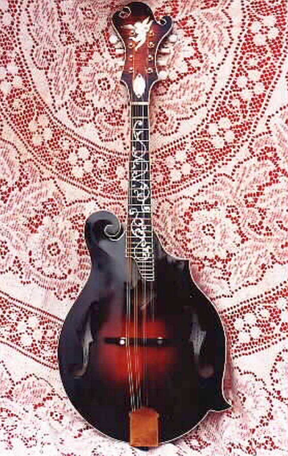 Solve silver angel mandolin jigsaw puzzle online with 96 pieces