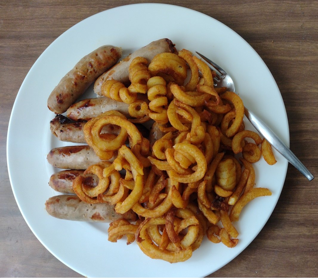 Solve Wobbly food sausages and curly fries jigsaw puzzle online with