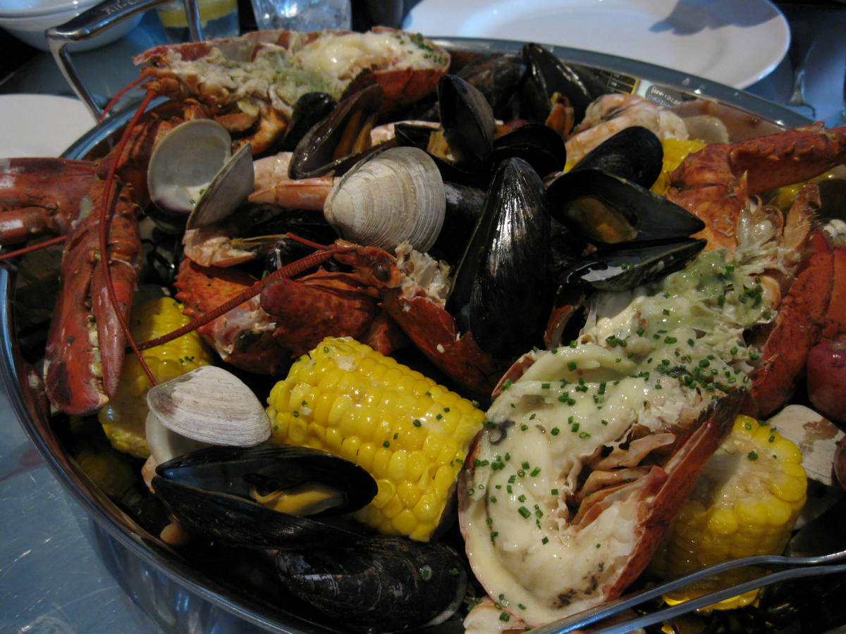 Solve New England clam bake steamed lobsters, clams, mussels, corn