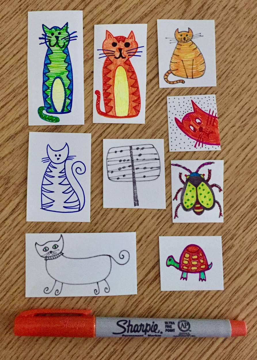 Solve Sharpie Cats + jigsaw puzzle online with 70 pieces