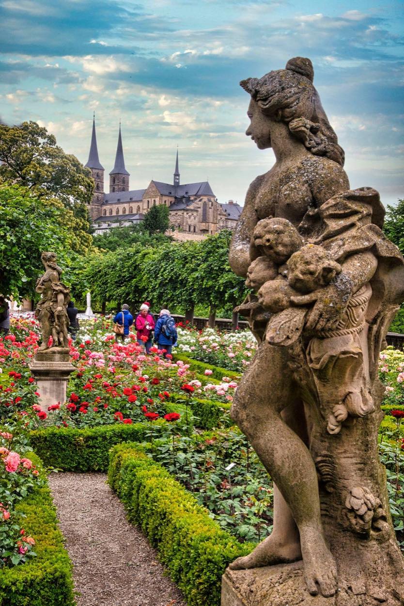 Solve the Rose Garden, with St Michael's Abbey in the background, in