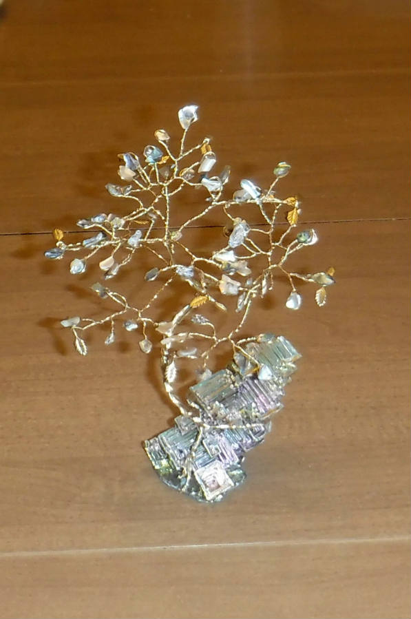 Solve Abalone Shells gem tree on a Bismuth crystal base jigsaw puzzle online with 24 pieces